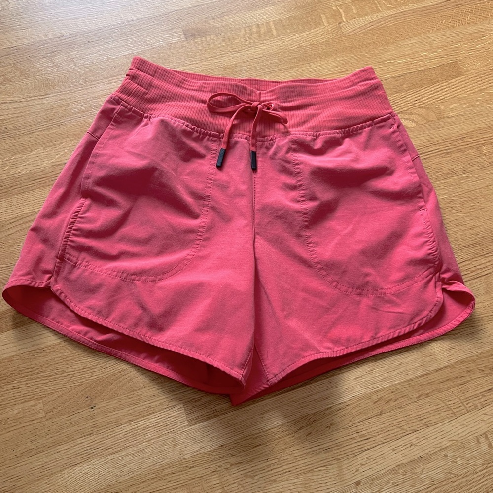 Alpine Pink Athletic Shorts with Curved Hem and Drawstring Waist
